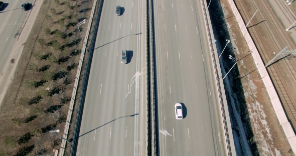 An Aerial View Of Commuters In Cars As They Drive Down The Busy Street