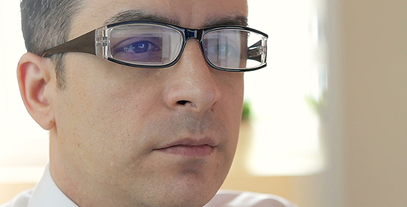 Businessman with Glasses Working on Computer 4