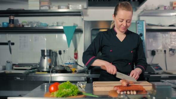 Chef Cutting Sausages alt