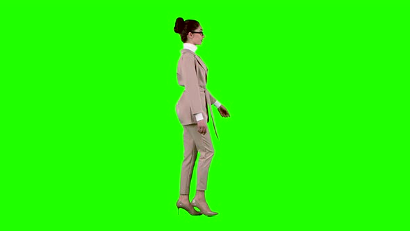 Woman Flirting Correcting Glasses. Green Screen. Side View. Slow Motion