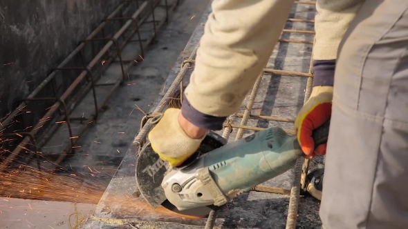 A Man Working With Angle Grinder