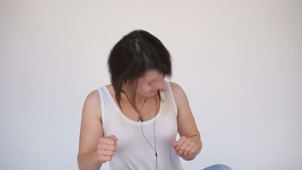 Woman Dancing With Earbuds