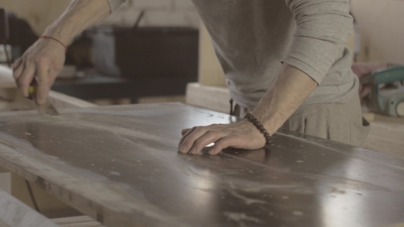 Woodworker Scratch Surface Of Wooden Board By Scraper Handware