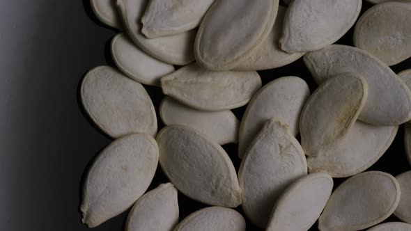 Cinematic, rotating shot of pumpking seeds - PUMPKIN SEEDS 006