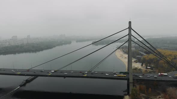 Concrete bridge with cars traffic is combined two sides of metropolis