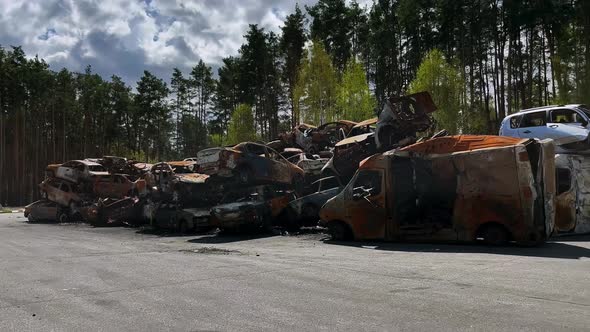 Car graveyard in Irpin, consequences of the invasion of the Russian army in Ukraine