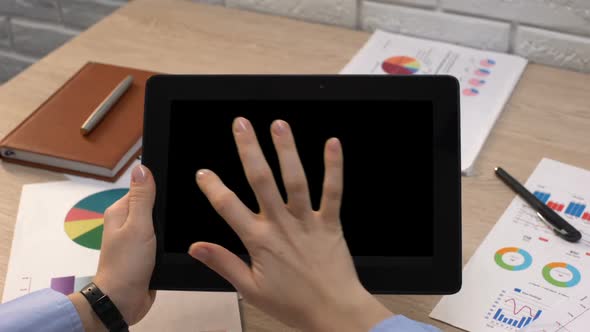 Business Spanish Application Against Flag on Tablet in Female Hands, Tutorial