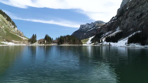 Seealpsee Lake In The Mountains Of Switzerland.