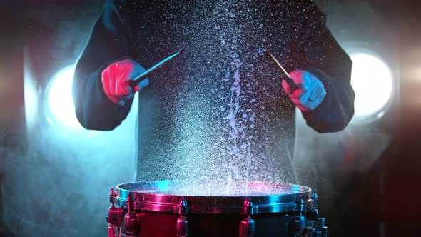 Super Slow Motion Shot of Drum Hit and Splashing Water at 1000 Fps