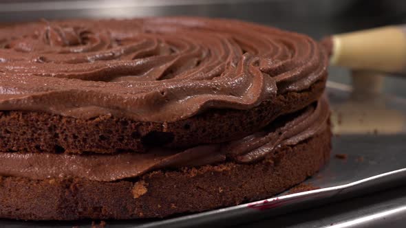 Dark Cake Base with Chocolate Frosting - Closeup