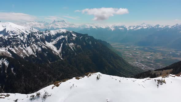 Aerial Drone View on Snowy Peaks of Swiss Alps. Switzerland. Rochers-de-Naye Mountain Peak