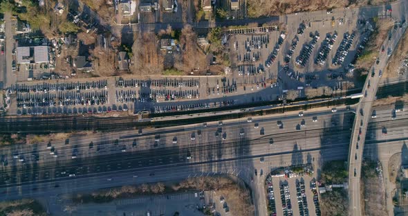 A busy highway and overpass in the early morning light