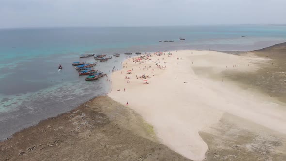 Aerial View Disappearing Island with Tourists and Boats in Menai Bay Zanzibar