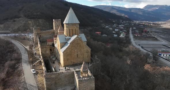 Aerial view of old Ananuri Fortress with two churches and picturesque view on river. Georgia 2022