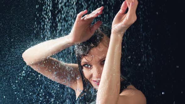 Portrait of Adorable Wet Woman Dancing Under Rain Slow Motion