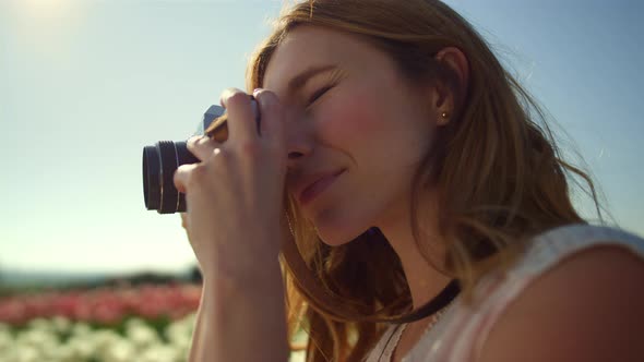 Closeup Young Woman Shooting Photos