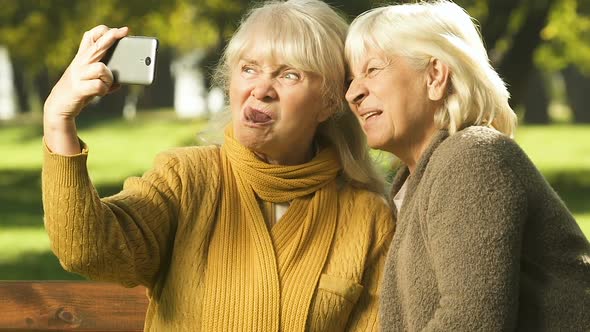 Happy Old Women Showing Grimaces on Cell Phone, Selfie App, Happy Time Together