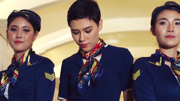 Cabin Crew Dancing with Joy in Airplane