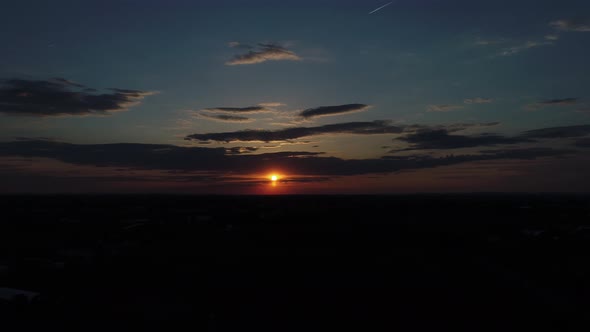Aerial View of a Sunset Across Amish Farm Lands as Seen by a Drone