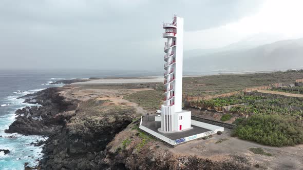 Lighthouse Look Out Tower Structure at Rocky Cliff Coast Atlantic Ocean Sea Line