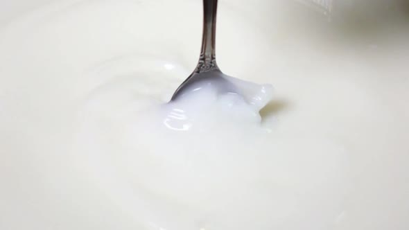 Spoon Mixing of a Milk