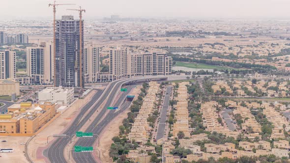 Aerial View of Apartment Houses and Villas in Dubai City Timelapse United Arab Emirates