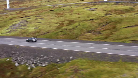 Drone Flight Tracking Car Driving Along Empty Road