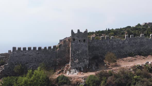 Old Town Castle Wall Shoreline. Flying over the amazing hilltop fortresses