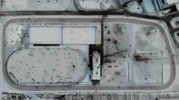 A Lot of People Skate on the Ice Rink in Open Street