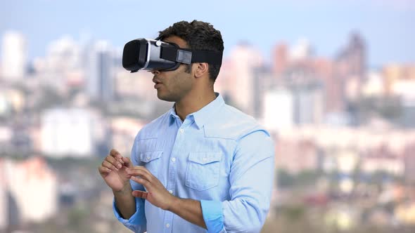 Scared Indian Guy Using Virtual Reality Glasses