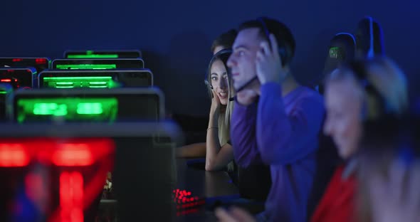 Team of Young People Plays in a Computer Club an Online Game