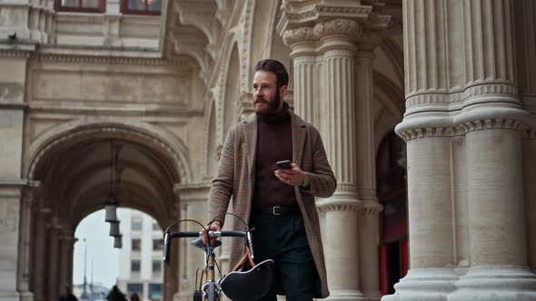 Young Man Using Smartphone with Mobile App