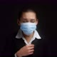 Asian Woman in Business Clothes and a Medical Mask Coughs - VideoHive Item for Sale