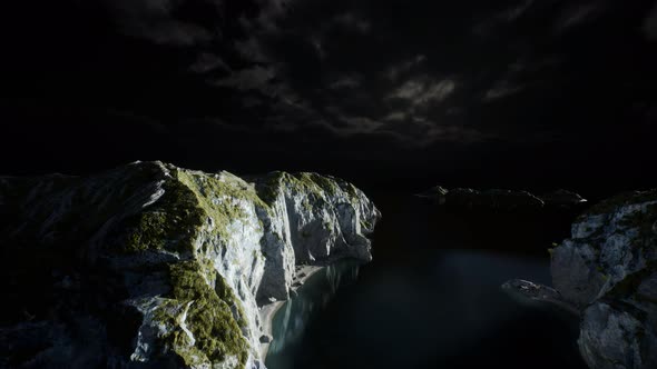 Fjord with Dark Storm Clouds