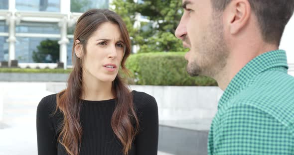 Man and Woman Talking to Each Other