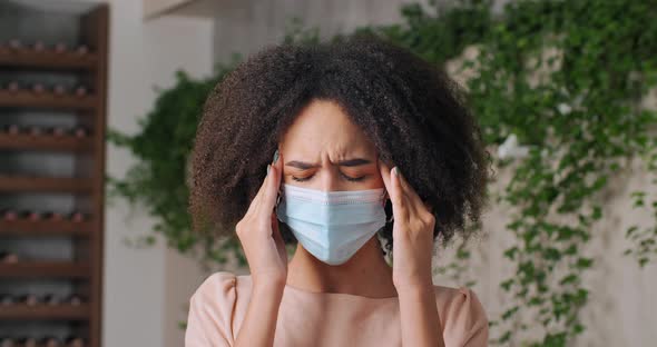 Front View of African American Woman Young Girl Wears Face Mask During Pandemic Suffering From