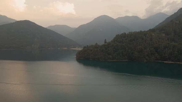 Extraordinary beauty of a splendid green lake ledro highlighted by the surrounding highland scenery