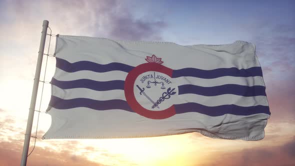 Cincinnati City of Ohio Flag Waving in the Wind Sky and Sun Background