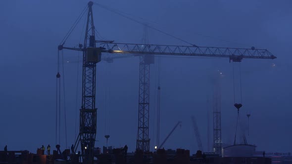 Construction Site at Dusk with Purple Sky