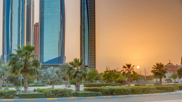 Skyscrapers of Abu Dhabi at Sunset with Etihad Towers Buildings Timelapse