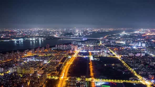 Aerial top view of city at night，timelapse