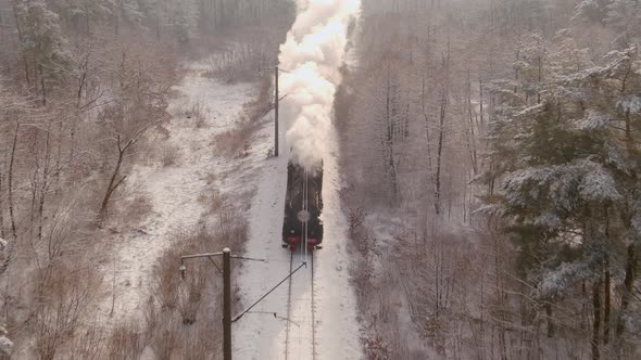 View of an Antique Restored Steam Locomotive Blowing Smoke Vehicle Traveling