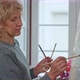 Woman Artist of Drawings Preparing to Create a Abstract Painting Image - VideoHive Item for Sale
