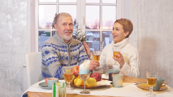 Old Daddy and His Favourite Daughter Sitting at Holiday Table