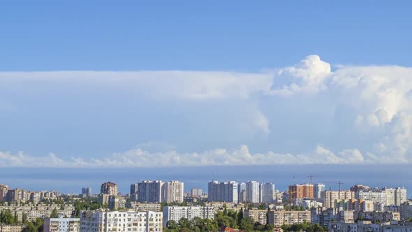 Sunny Summer Town and Daytime Clouds