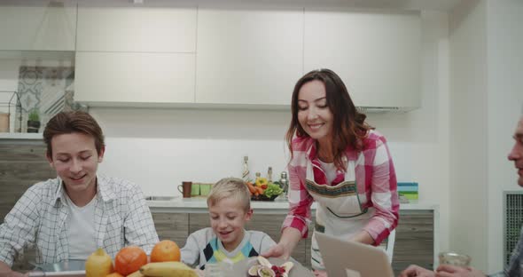 Mature Woman Cooking Happy on the Morning for Her