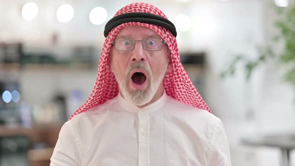 Horrified Senior Old Arab Businessman Feeling Shocked 