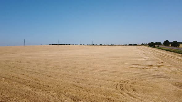 Aerial drone view of a flying over the rural agricultural landscape.