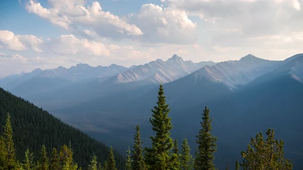 Timelapse of mountains and coniferous trees