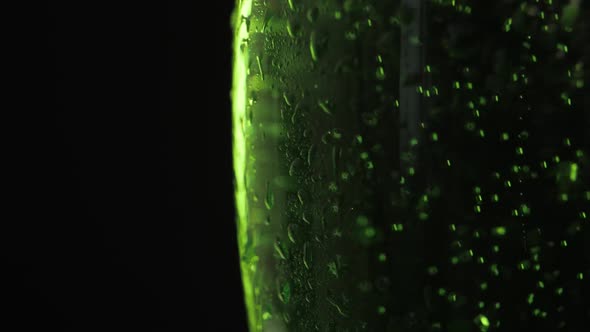 St. Patric's Day Green Beer rotated over dark background